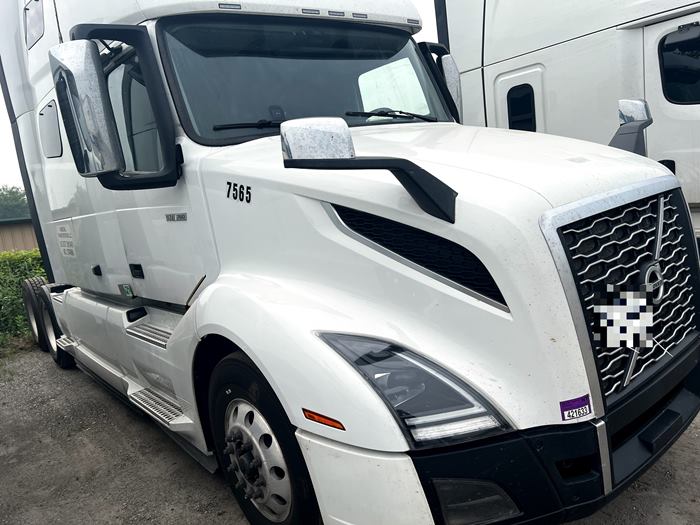 White Volvo VNL 760 semi truck, front view